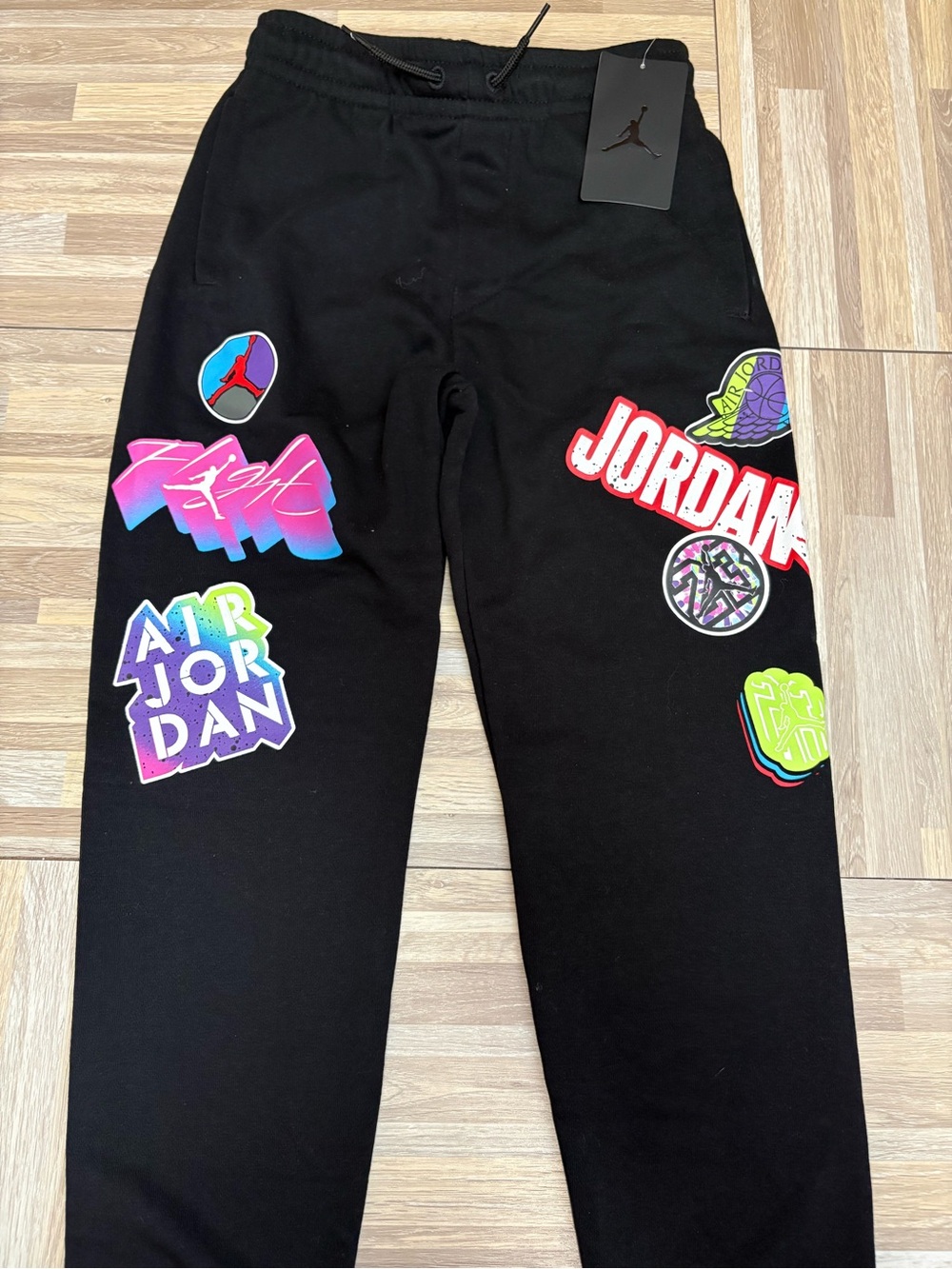Nike Black Sweatpants with Multicolor Jordan Patch Graphics